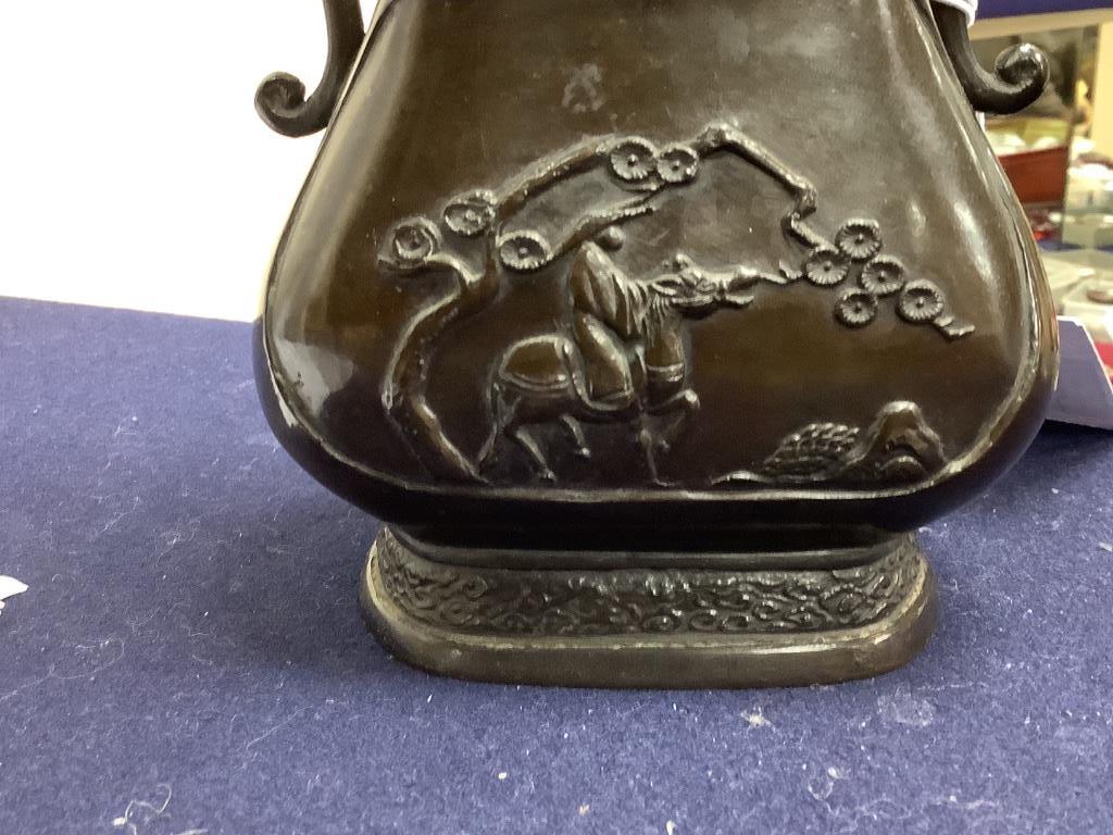 A Chinese bronze two handled flower vase, Ming dynasty, 24.5cm